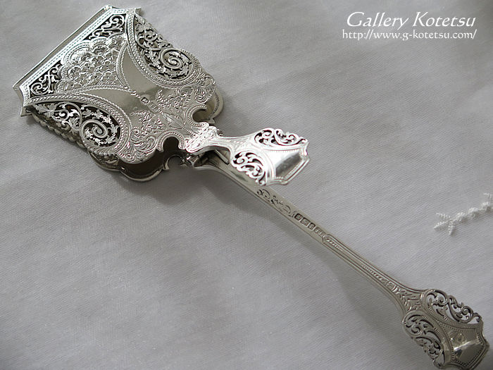 Vo[ThCb`gO antique silver tong